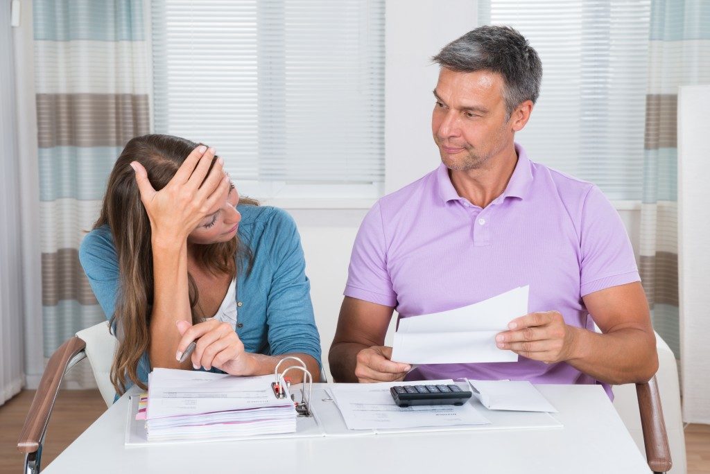 problematic couple looking at documents