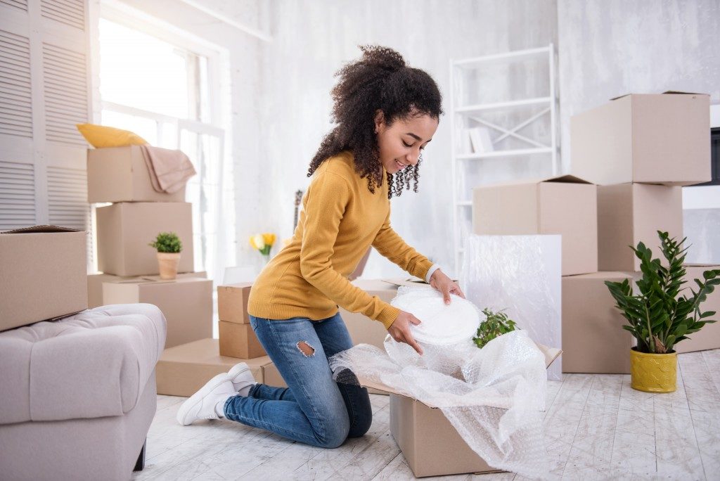 young girl unpacking her things