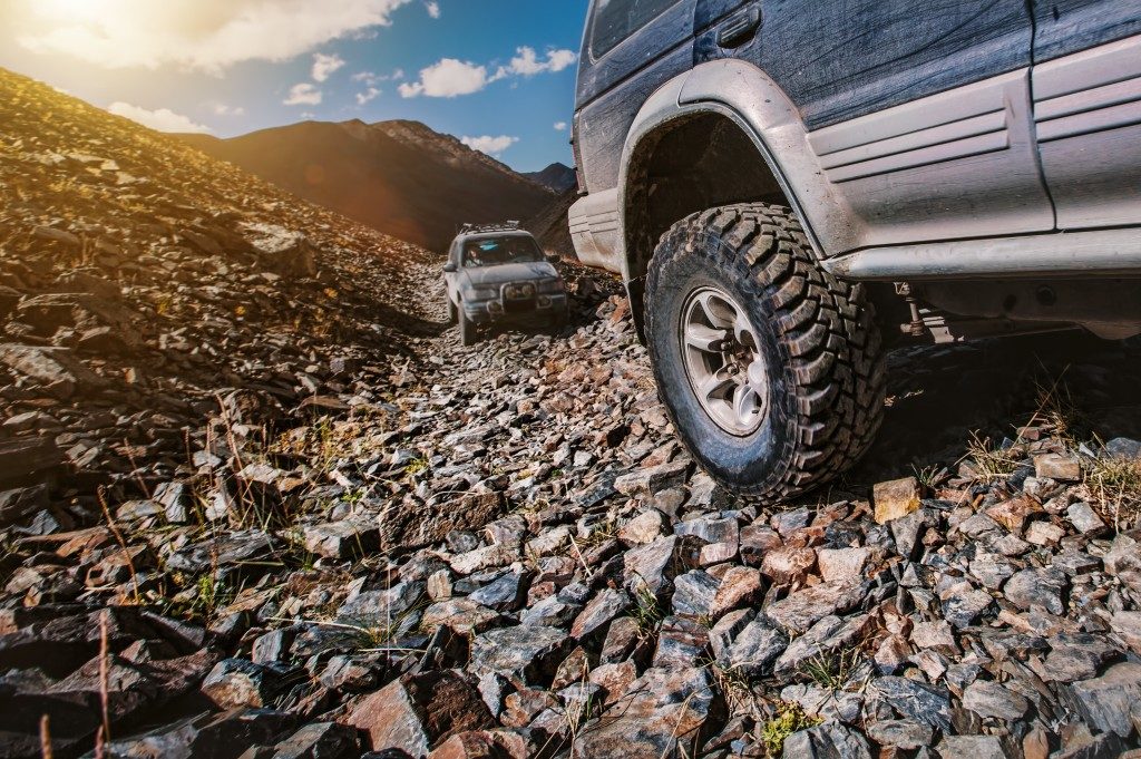 Cars on off road trail