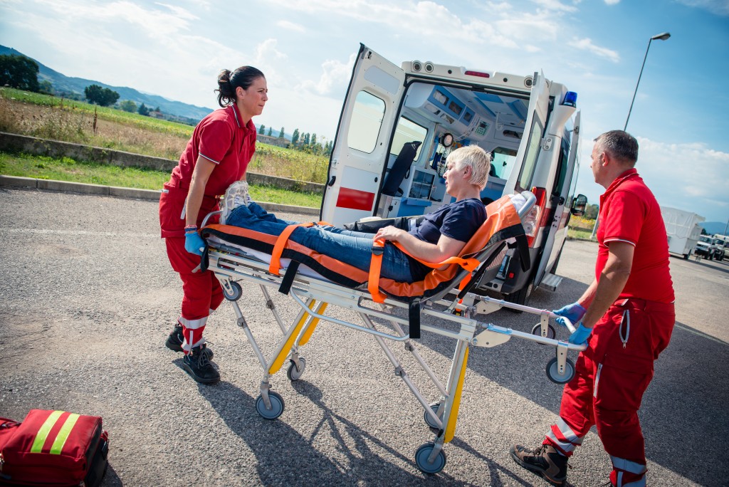 ambulance carrying patient from an accident