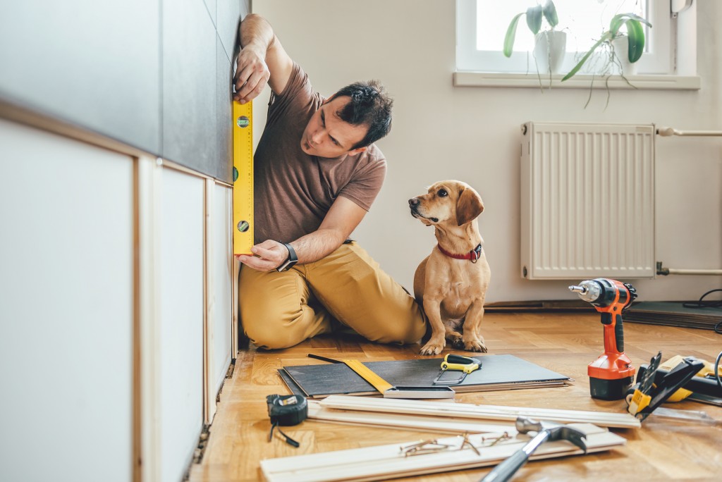 man renovating his home