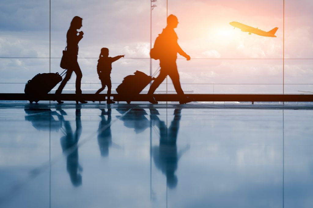 family walking at the airport