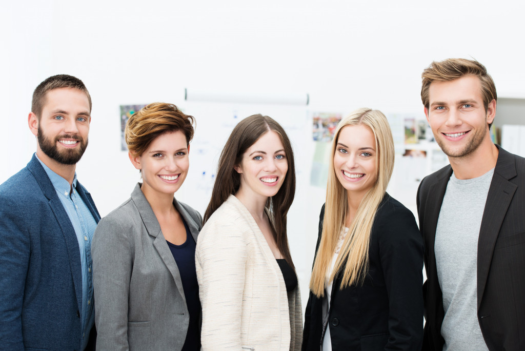 Group of employees smiling