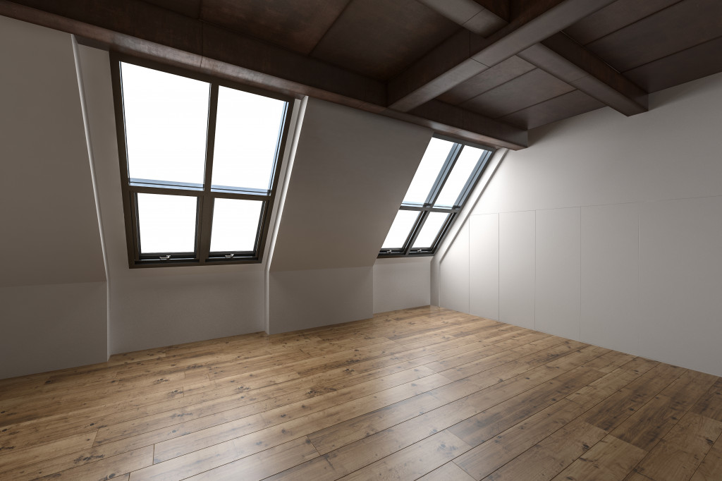 attic with hardwood floor