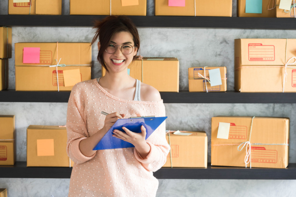 a woman holding a clipboard