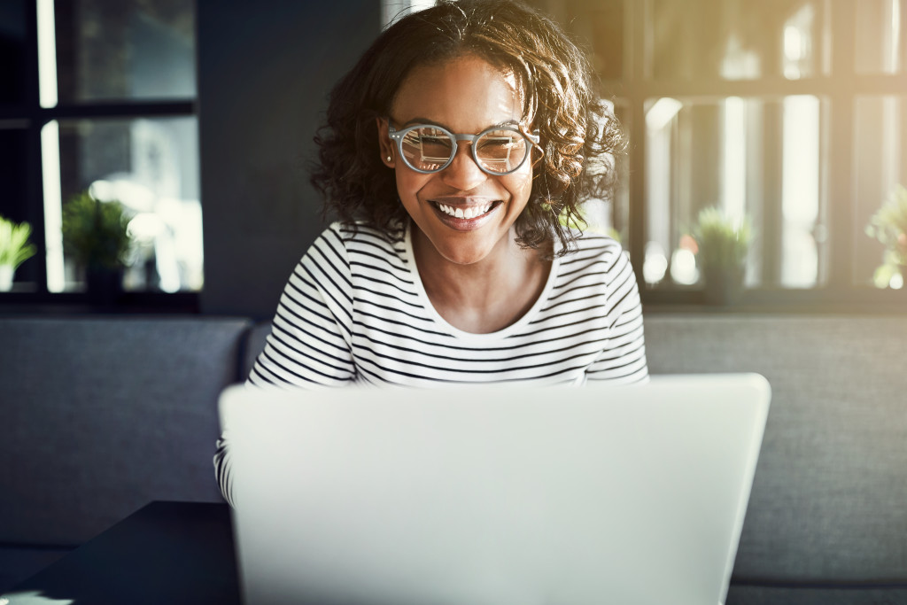 a woman using her computer