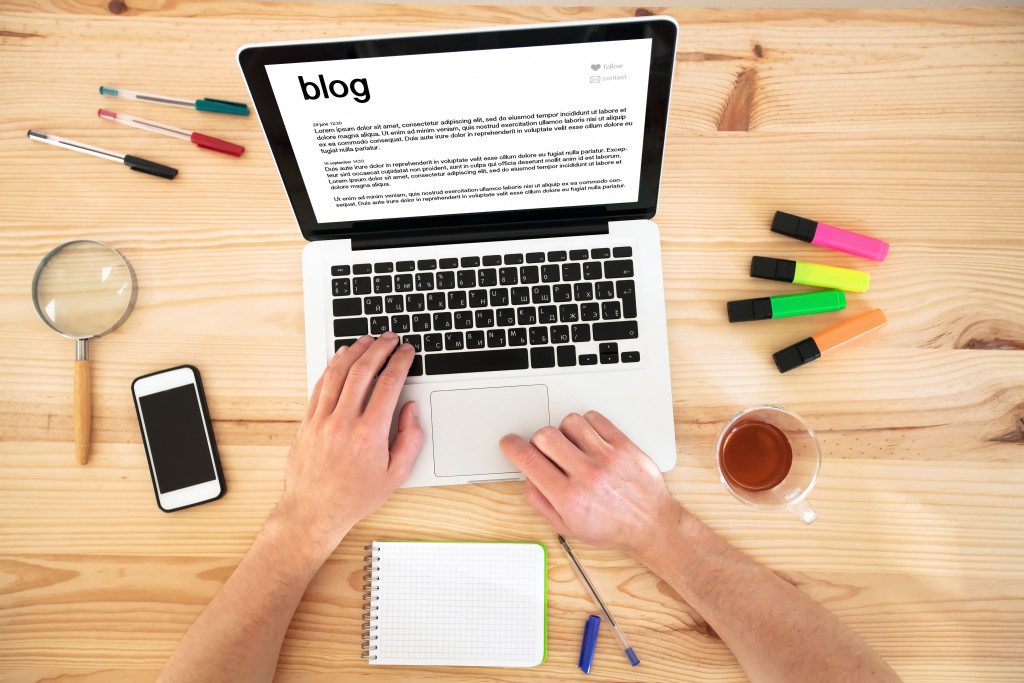 A writer drafting a blog about a business