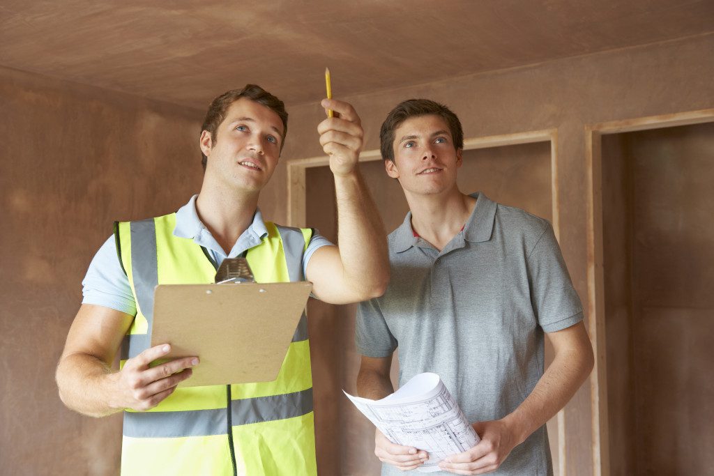 A home inspector looking into a new home