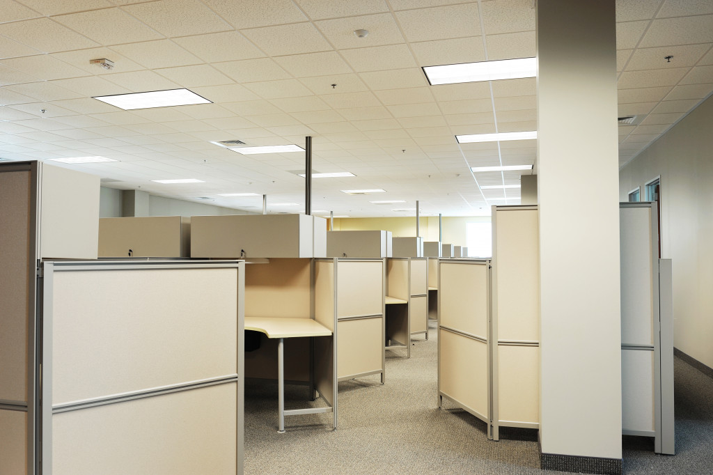 An office space with cubicle dividers