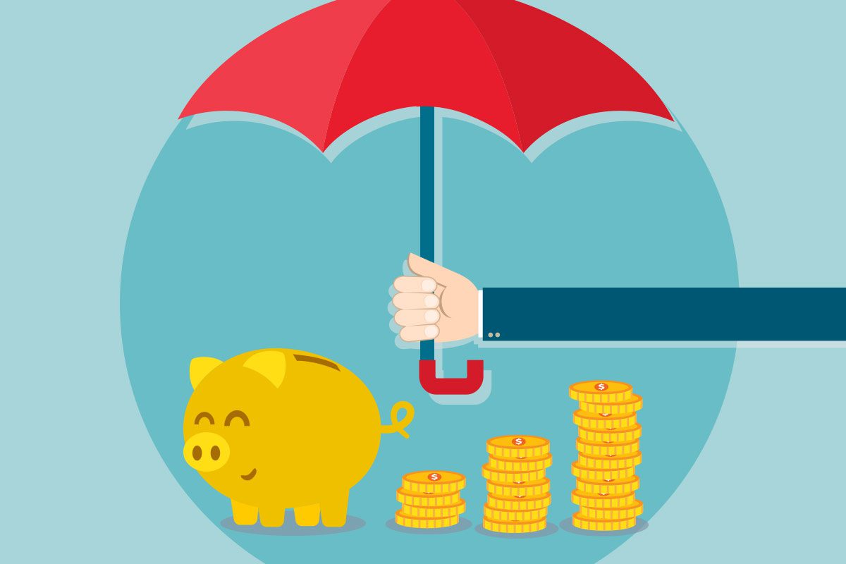 piggy bank and coins under an umbrella