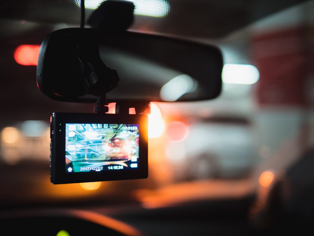 dash camera installed in a car at night